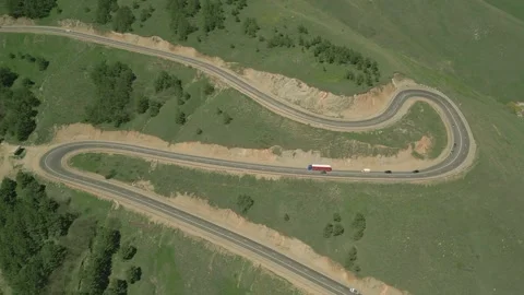 Serpentine between the hills in Lori Oblast in Armenia. Highway, cars, mountains Stock Footage 252907959