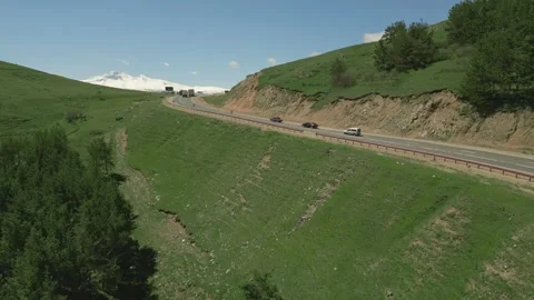 Serpentine between the hills in Lori Oblast in Armenia. Highway, cars, mountains Video stock 252930802