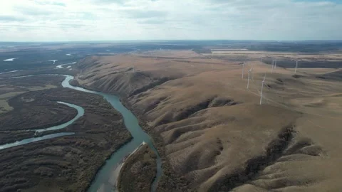 Serpentine River Channels Across Open Grassland in Arxan, China Stock Footage 344036785