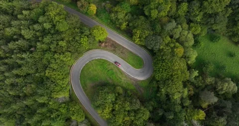 Serpentine road in the eifel region. Forest and moutnain drive Stock Footage 288039023