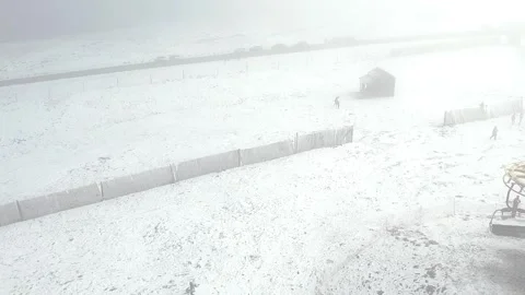 Serra da Estrela ski resort under a dense blizzard, displaying a damaged Stock Footage 333161155