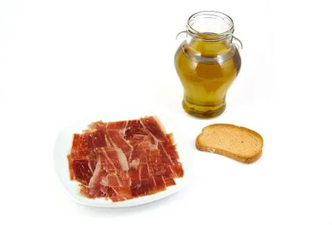 Serrano ham, bread and olive oil. Jabugo. Mediterranean diet Stock Photos
