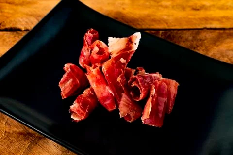 Serrano ham chips from Spain. Stock-Fotos