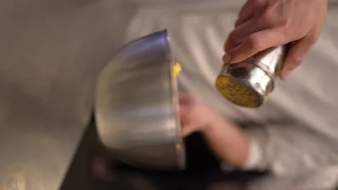 Serrated potatoes blended with spices - Vertical Stock Footage 196141480