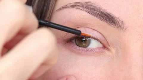 Serum for growth and density of eyelashes with oils and peptides. Close-up of a Stock Footage 233826343