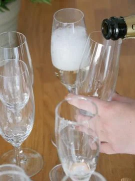 Serve champagne Stock Photos