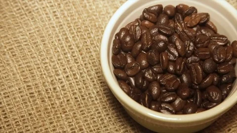 Serve coffee beans in rotation.Full hd video Stock Footage 72108311