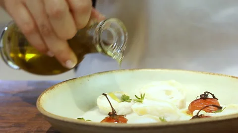 Serve final dish with olive oil Shish Barak with Yogurt Recipe Stock Footage 68777841