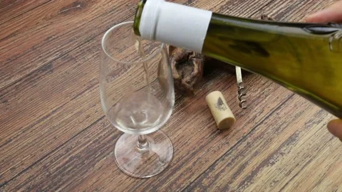Serve a glass of white wine Stock Footage 150551307