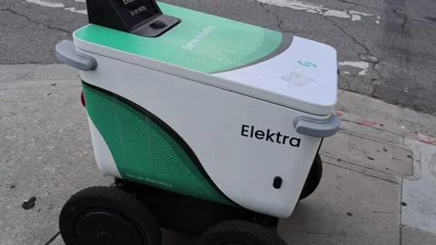 Serve Robotics Delivery Robot on the Street, Delivering Food to a Customer Stock Footage 321036596