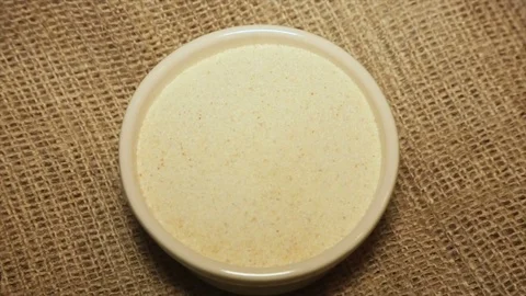 Serve semolina while rotating, close-up Stock Footage 72037837