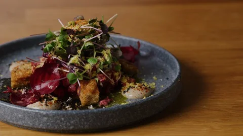 Served beef Tar Tar on dish macro shot, five star meal Stock Footage 128484690