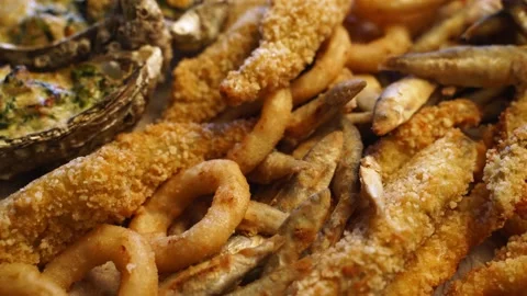 Served deep fried fish mix food set composition. Cook made squid rings, sprat Stock Footage 158853763