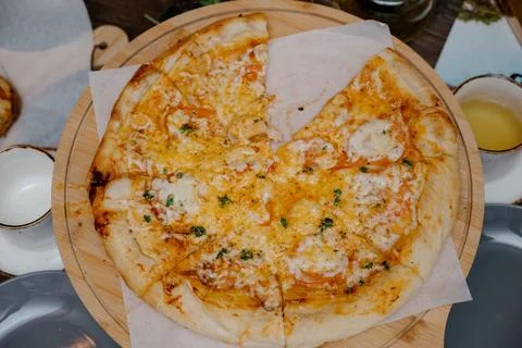 The served dinner table with pizza Stock Photos