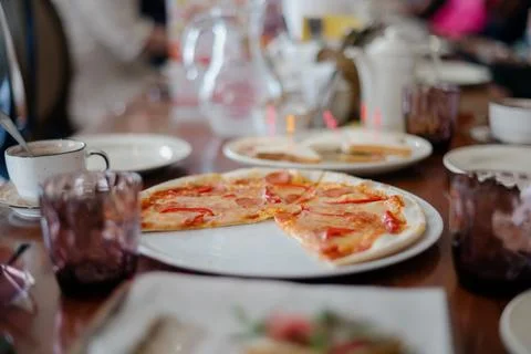 The served dinner table with pizza Stock Photos