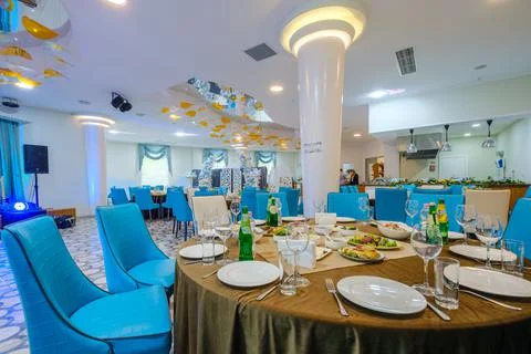 Served dinner table in a restaurant. Restaurant interior 写真素材