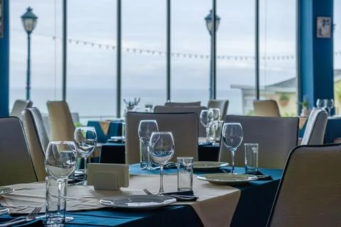 Served dinner table in a restaurant. Restaurant interior Fotos de archivo