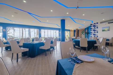 Served dinner table in a restaurant. Restaurant interior Fotos Stock