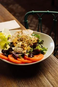 Served dish with vegetables placed on table Foto stock