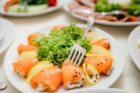 Served dishes to the table for holiday. Stock Photos
