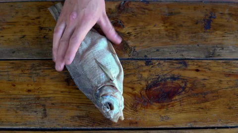 Served dried fish and beer on the table. Stock Footage 134646756