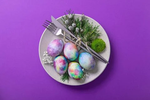 Served Easter plate with eggs and flowers Stock Photos
