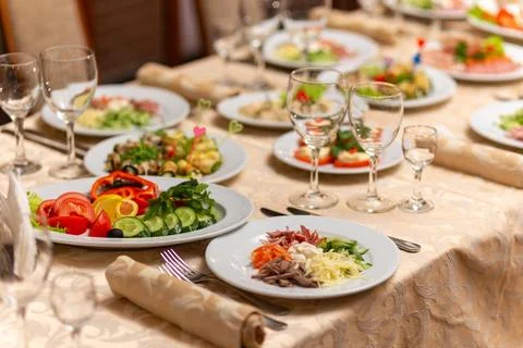 Served festive table with snacks, glasses, glasses, cutlery and napkins for a Fotos Stock