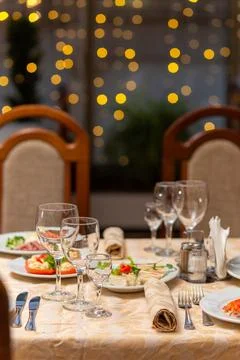Served festive table with snacks, glasses, glasses, cutlery and napkins for.. Fotos Stock