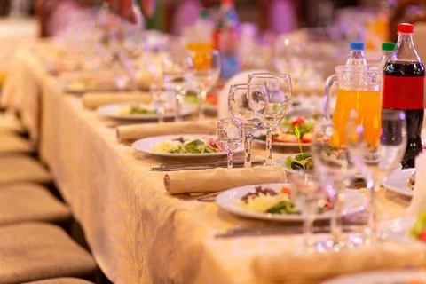 Served festive table with snacks, glasses, glasses, cutlery and napkins for a Fotos Stock