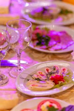 Served festive table with snacks, glasses, glasses, cutlery and napkins for.. Stock Photos