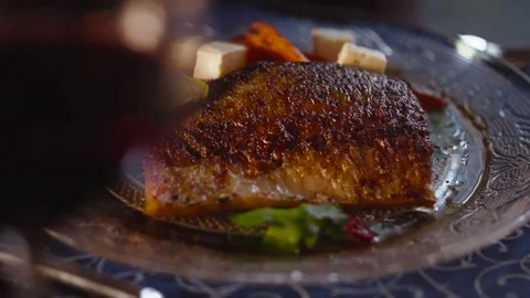 Served grilled fish with lemon and cheese. Being gourmet. Restaurant food. Stock Footage 74624595