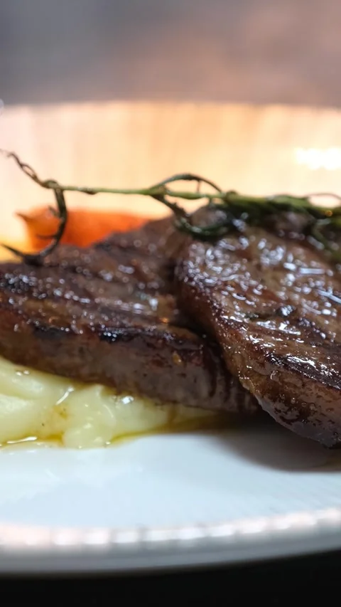 Served Grilled Meat Dish on Plate Vertical Video Stock Footage 334872007