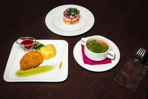 Served lunch on the table on a dark background. Lunch with tea Foto stock