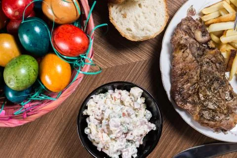 Served lunch on the table with meat and Easter eggs Foto stock