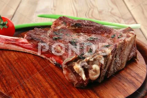 Served main course: boned roasted ribs Stock Photos
