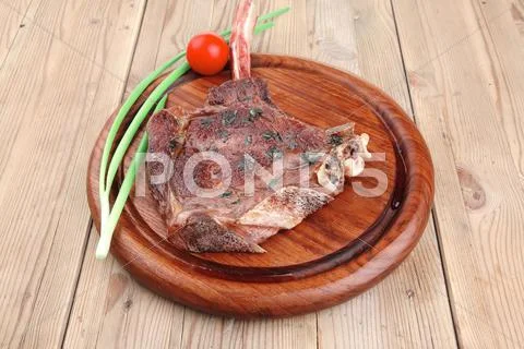 Served main course: boned roasted ribs Stock Photos