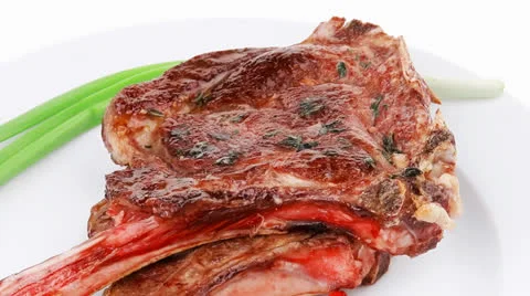 Served main course: grilled pork ribs served with raw red chili 스톡 동영상 24655267