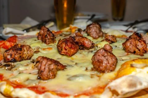 Served pizza with meat Stock Photos