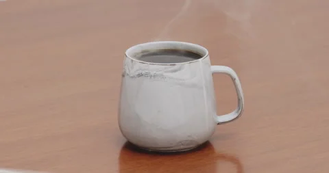 Served Smoking hot black specialty coffee on wooden table Stock Footage 239281159