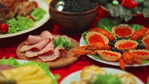 Served table close-up, meat cut, crayfish, caviar. Greens, appetizers, a variety Stock Footage 264384928