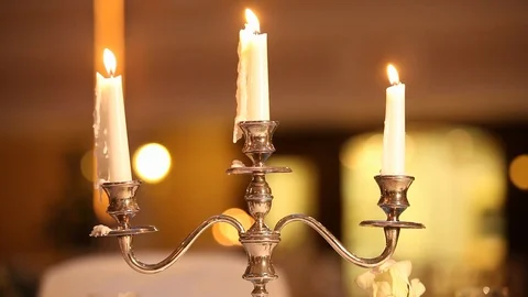 Served table with dishes and candles in a restaurant Stock Footage 121273708