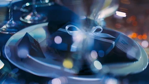 Served Table For Guests At The Wedding. Surprise Box On A Plate. Video stock 110755238