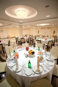 Served table in the interior Stock Photos