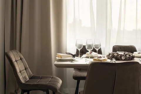 Served table in modern dining room Stock Photos
