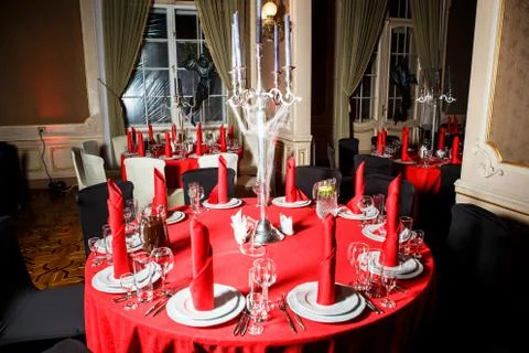 Served table in red and white colors in gothic style Stock Photos