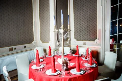 Served table in red and white colors in gothic style 写真素材