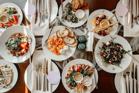Served table in a restaurant with various snacks close-up Fotos de archivo