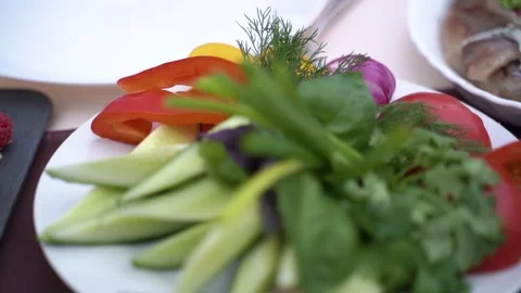 Served table with sausage and meat and vegetable cuts. Slow motion 動画素材 248389973