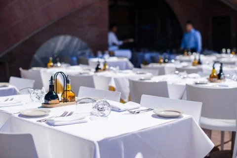 Served table set at restaraunt in New York outdoors Stock Photos