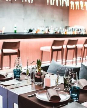 Served table for several persons in a restaurant Stock-Fotos